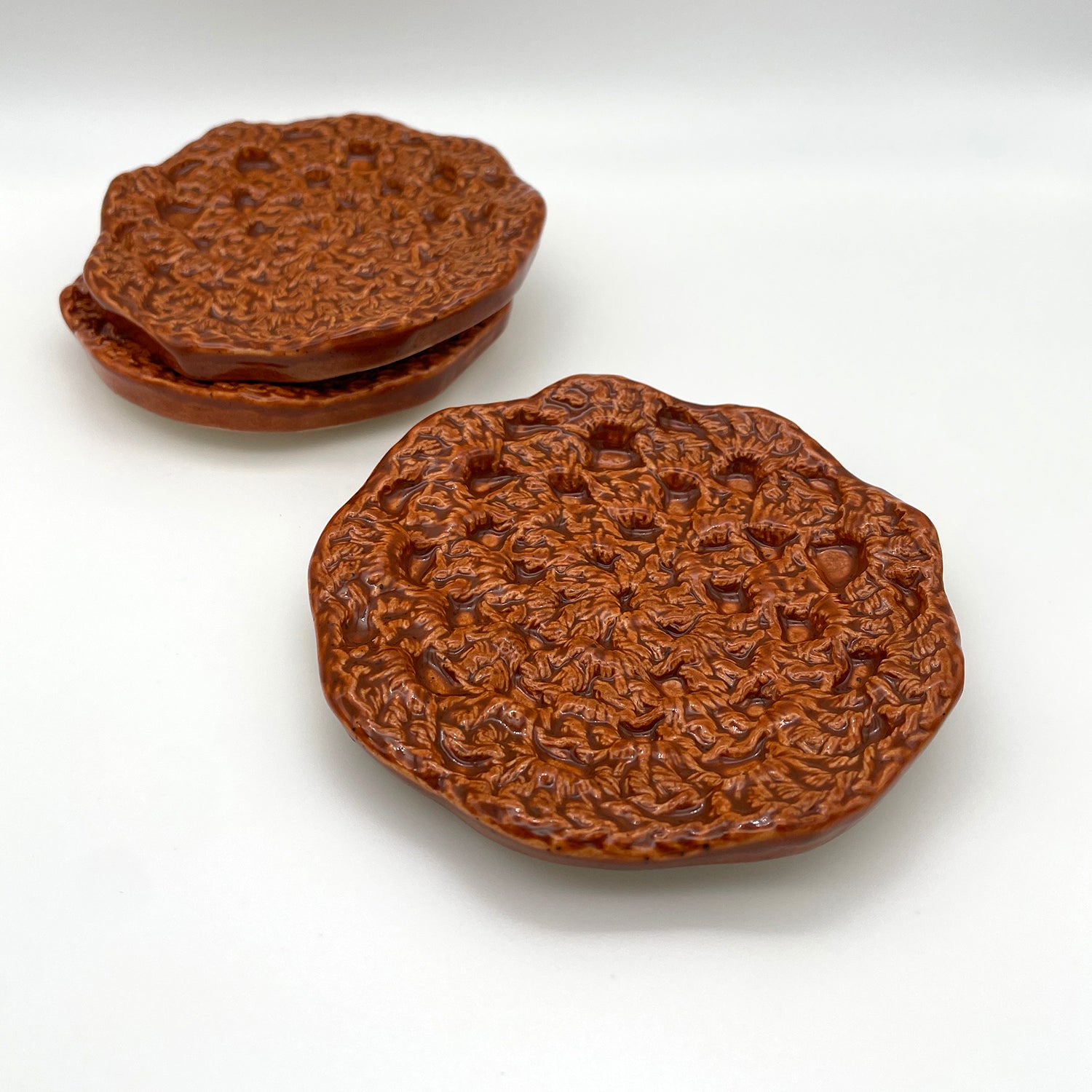 Artisan-crafted ceramic jewelry tray – a large, crochet-textured ring dish for stylish storage burnt orange shana ostrowiecki