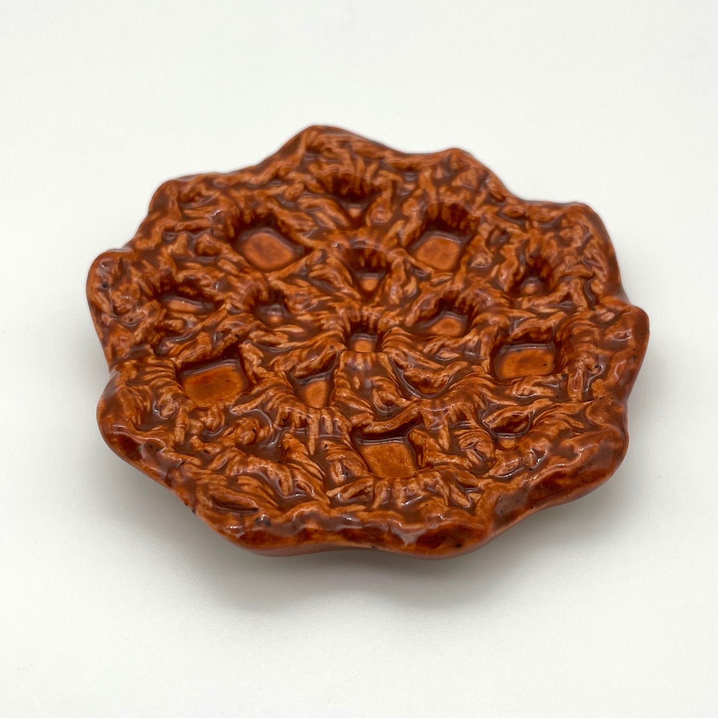Artisan-crafted ceramic jewelry tray – small, crochet-textured ring dish for elegant storage burnt orange