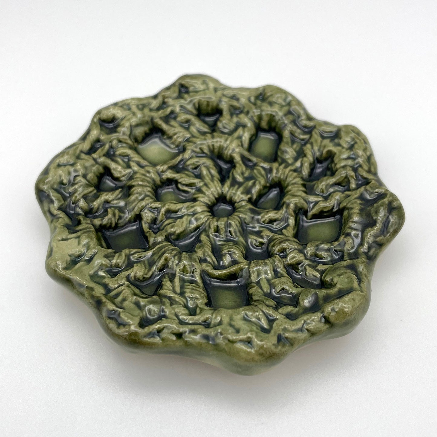 Luxury handmade ceramic ring dish – a small, elegant jewelry holder with a crochet-style texture green