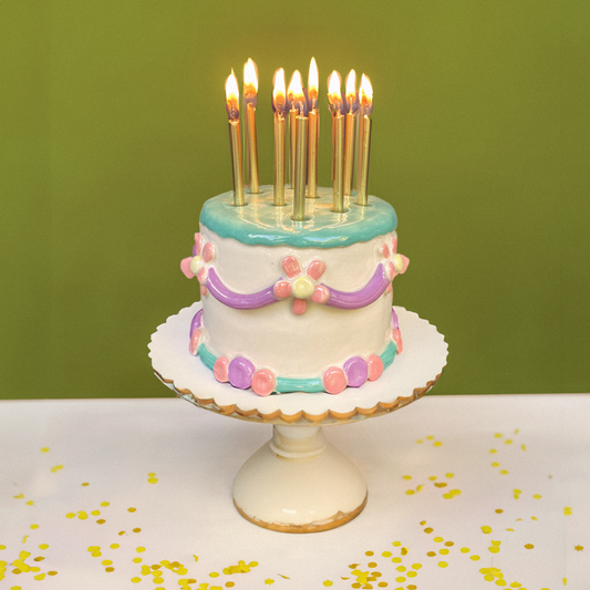 Hand-painted Hanukkah menorah with birthday cake menorah design and vibrant colors, menorah cake