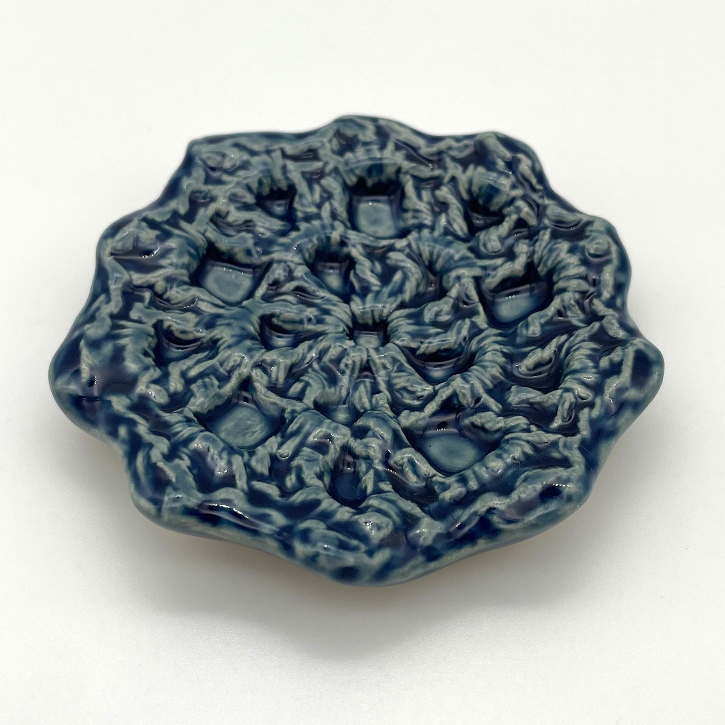 Petite ceramic catch-all tray for jewelry, featuring a handcrafted crochet-inspired design