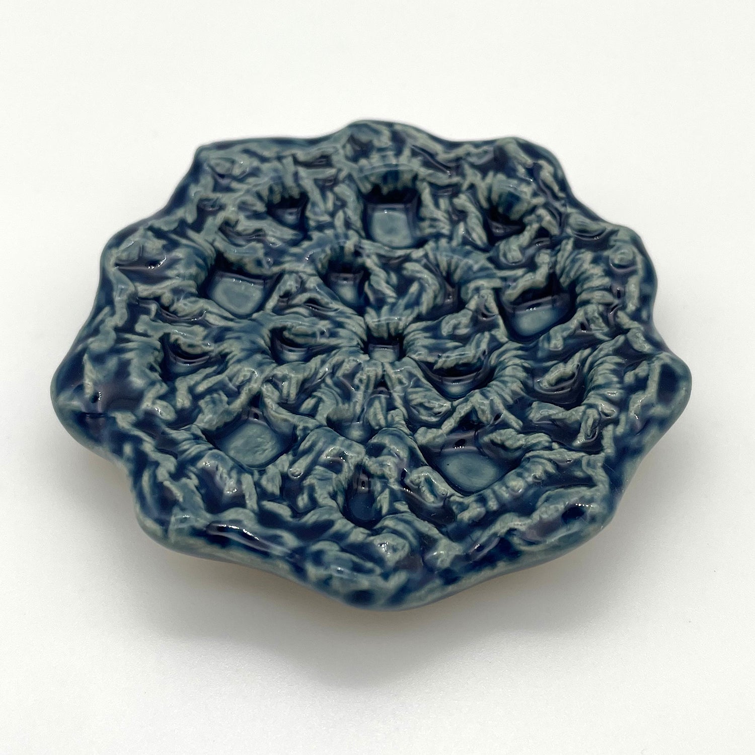Petite ceramic catch-all tray for jewelry, featuring a handcrafted crochet-inspired design