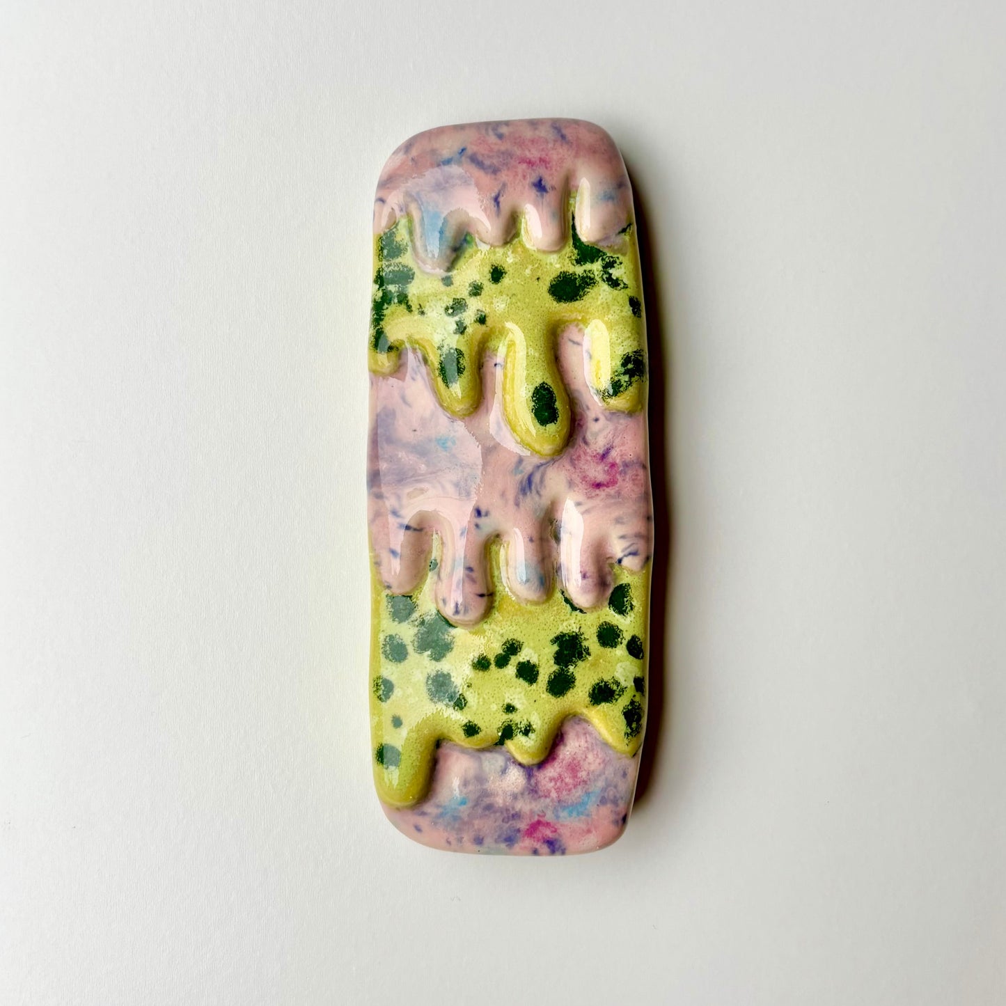 Green and pink mezuzah case drippy melty ceramic handmade handpainted shana Ostrowiecki dopamine core dopamine decor dopamine judaica