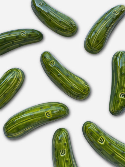 Assorted green dill pickle mezuzahs for unique Jewish gifts