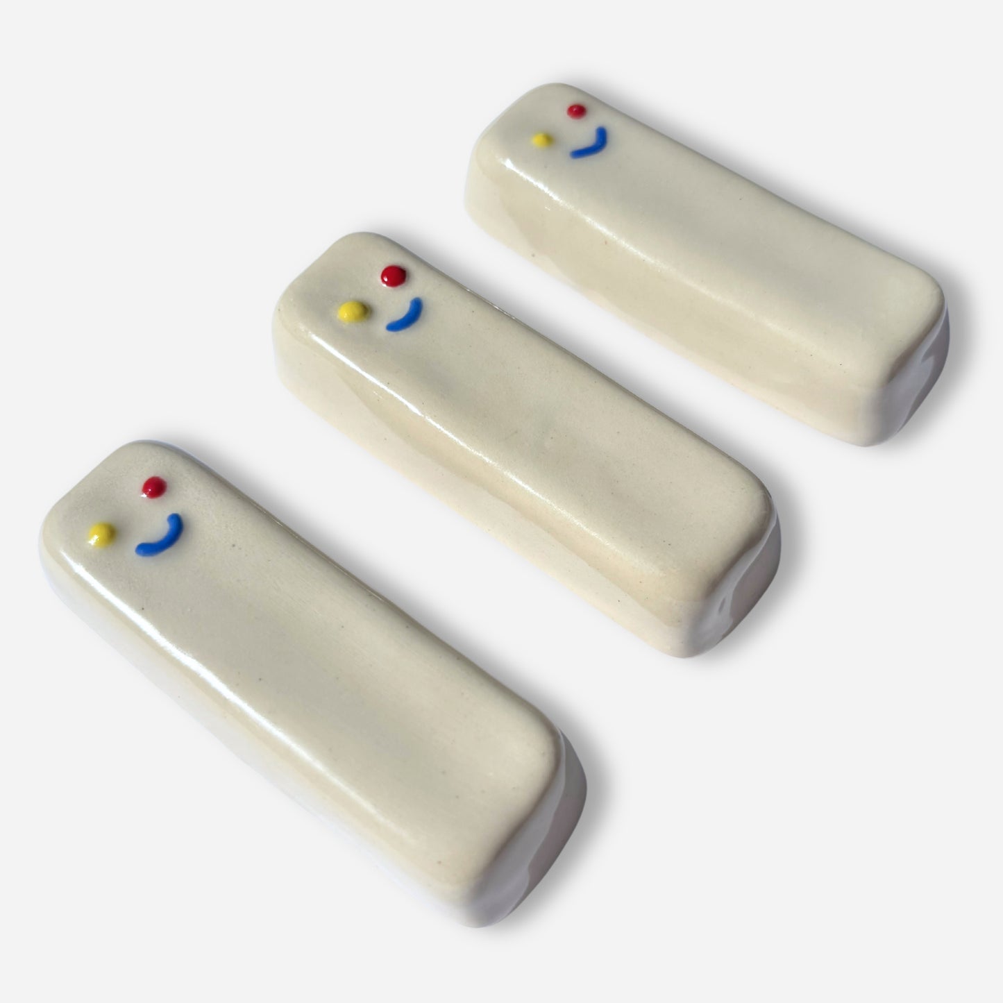 handmade mezuzah cases ceramic smiley face colorful minimalist judaica gift
