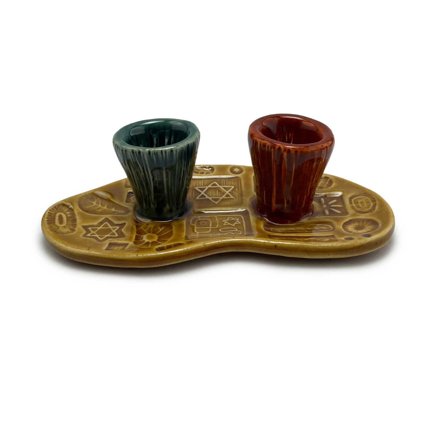 Jewish pottery shabbat candle holder for candlesticks, ceramic handmade sabbath day candle stand holder for jewish sabbath, handmade pottery for judaism shabbat judaica store and jewish gifts. Handcrafted jewish art by judaica artist Shana Ostrowiecki in California, made in the usa. Handpainted and one of a kind teal blue burnt orange mustard yellow