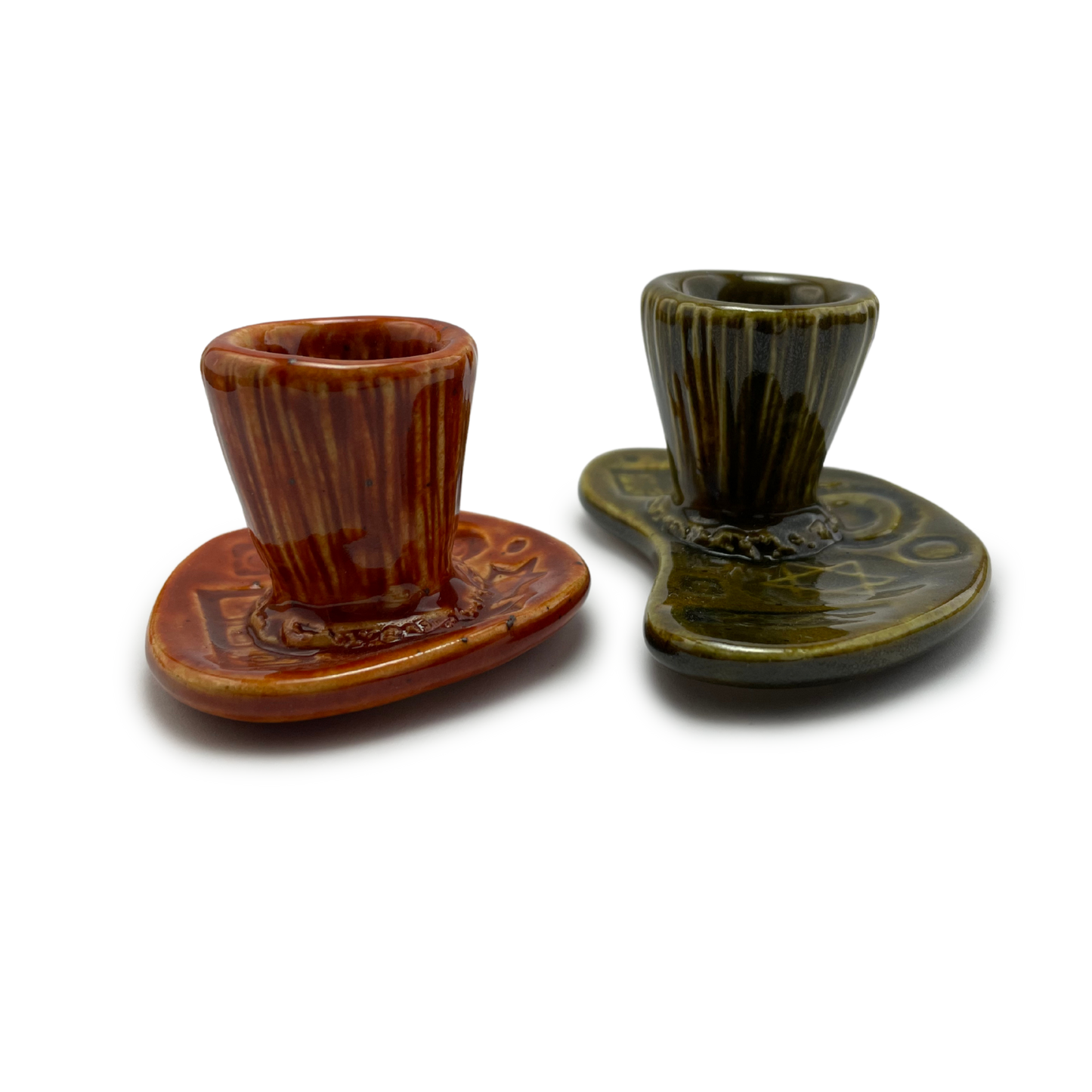 Jewish pottery shabbat candle holder for candlesticks, ceramic handmade sabbath day candle stand holder for jewish sabbath, handmade pottery for judaism shabbat judaica store and jewish gifts. Handcrafted jewish art by judaica artist Shana Ostrowiecki in California, made in the usa. Handprinted and one of a kind burnt orange olive green