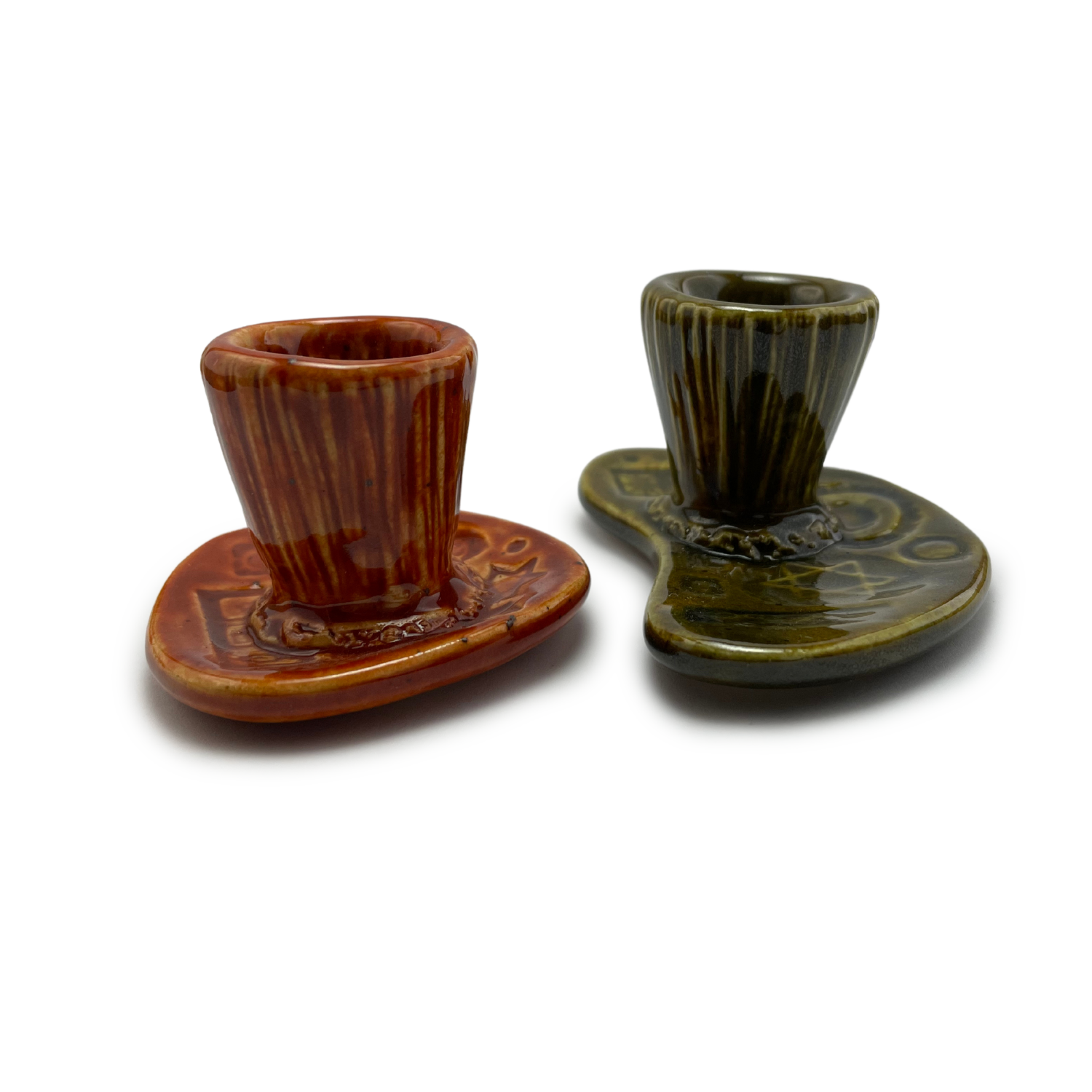 Jewish pottery shabbat candle holder for candlesticks, ceramic handmade sabbath day candle stand holder for jewish sabbath, handmade pottery for judaism shabbat judaica store and jewish gifts. Handcrafted jewish art by judaica artist Shana Ostrowiecki in California, made in the usa. Handprinted and one of a kind burnt orange olive green