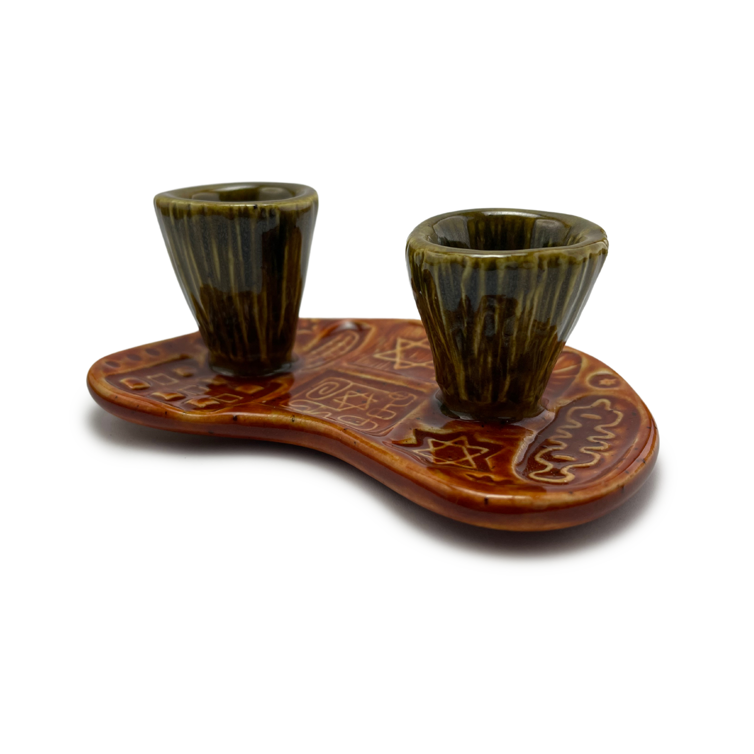 Jewish pottery shabbat candle holder for candlesticks, ceramic handmade sabbath day candle stand holder for jewish sabbath, handmade pottery for judaism shabbat judaica store and jewish gifts. Handcrafted jewish art by judaica artist Shana Ostrowiecki in California, made in the usa. Handpainted and one of a kind burnt orange olive green