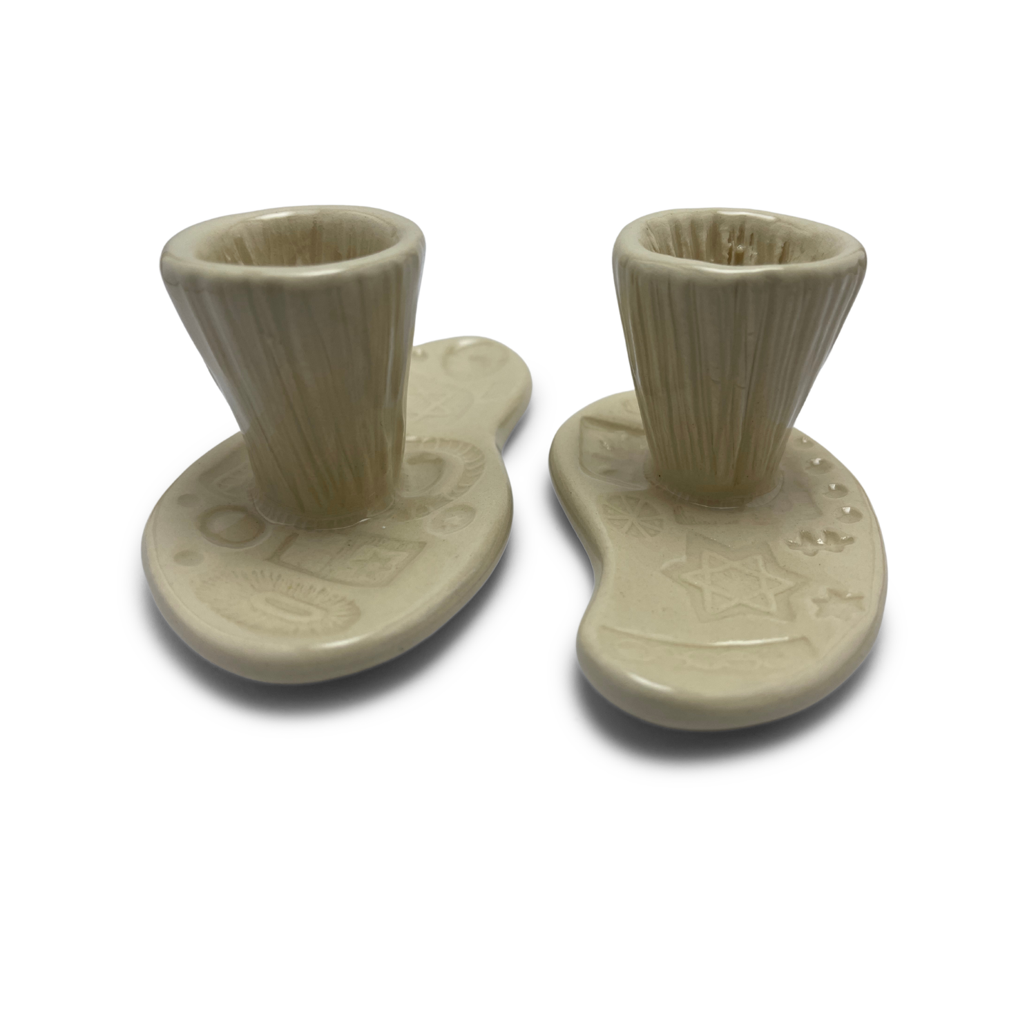 Jewish pottery shabbat candle holder for candlesticks, ceramic handmade sabbath day candle stand holder for jewish sabbath, handmade pottery for judaism shabbat judaica store and jewish gifts. Handcrafted jewish art by judaica artist Shana Ostrowiecki in California, made in the usa. Handprinted and one of a kind off white cream