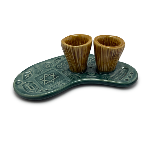 Jewish pottery shabbat candle holder for candlesticks, ceramic handmade sabbath day candle stand holder for jewish sabbath, handmade pottery for judaism shabbat judaica store and jewish gifts. Handcrafted jewish art by judaica artist Shana Ostrowiecki in California, made in the usa. Handpainted and one of a kind teal blue mustard yellow