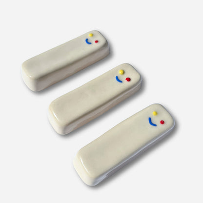 set of three handmade ceramic mezuzah cases smiley face modern judaica decor