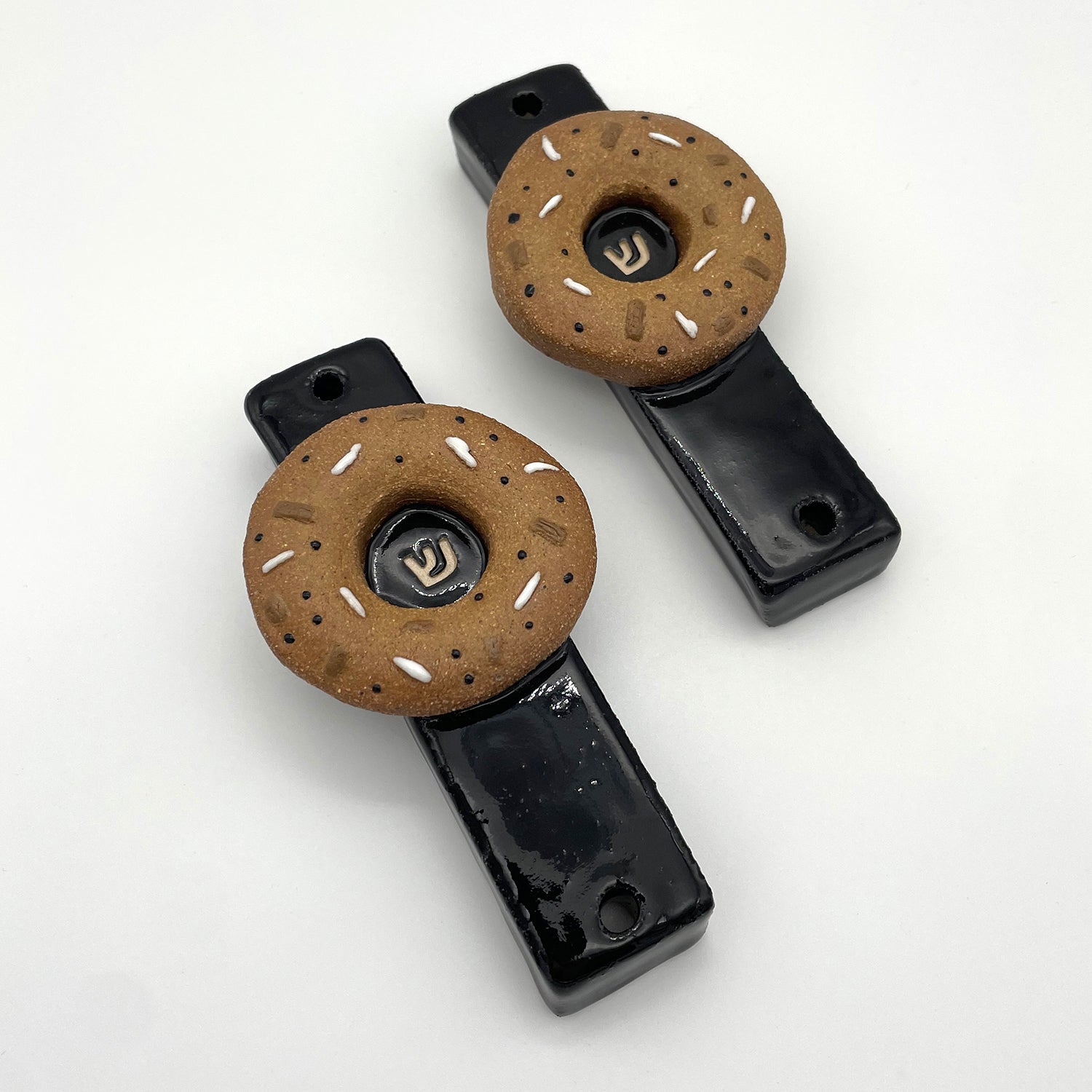 Handmade bagel mezuzah in natural light – a fun, unique Jewish gift for kids' rooms, birthday gifts, or Bar Mitzvah presents
