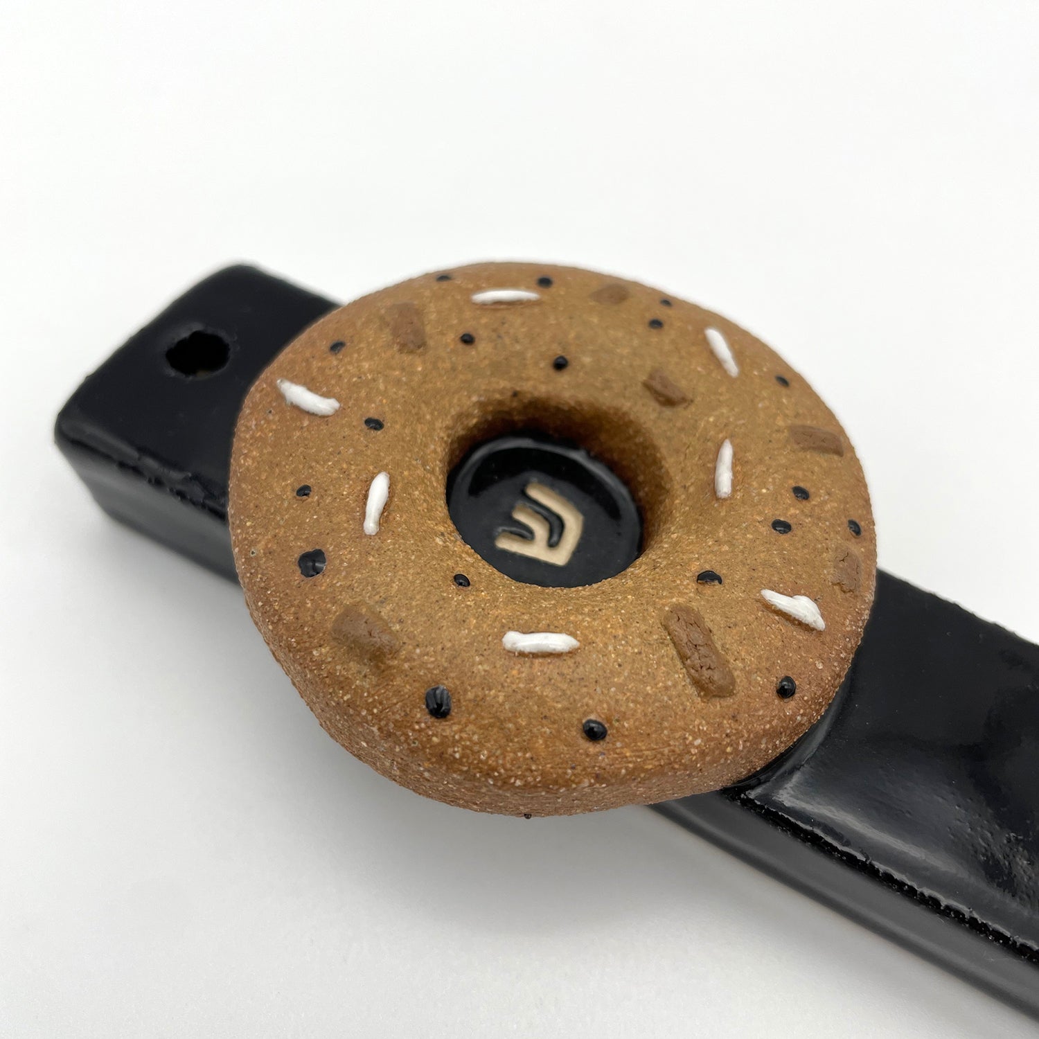 Handcrafted bagel mezuzah – unique Jewish gift for kids' bedrooms, Bar Mitzvah celebrations, and home decor.