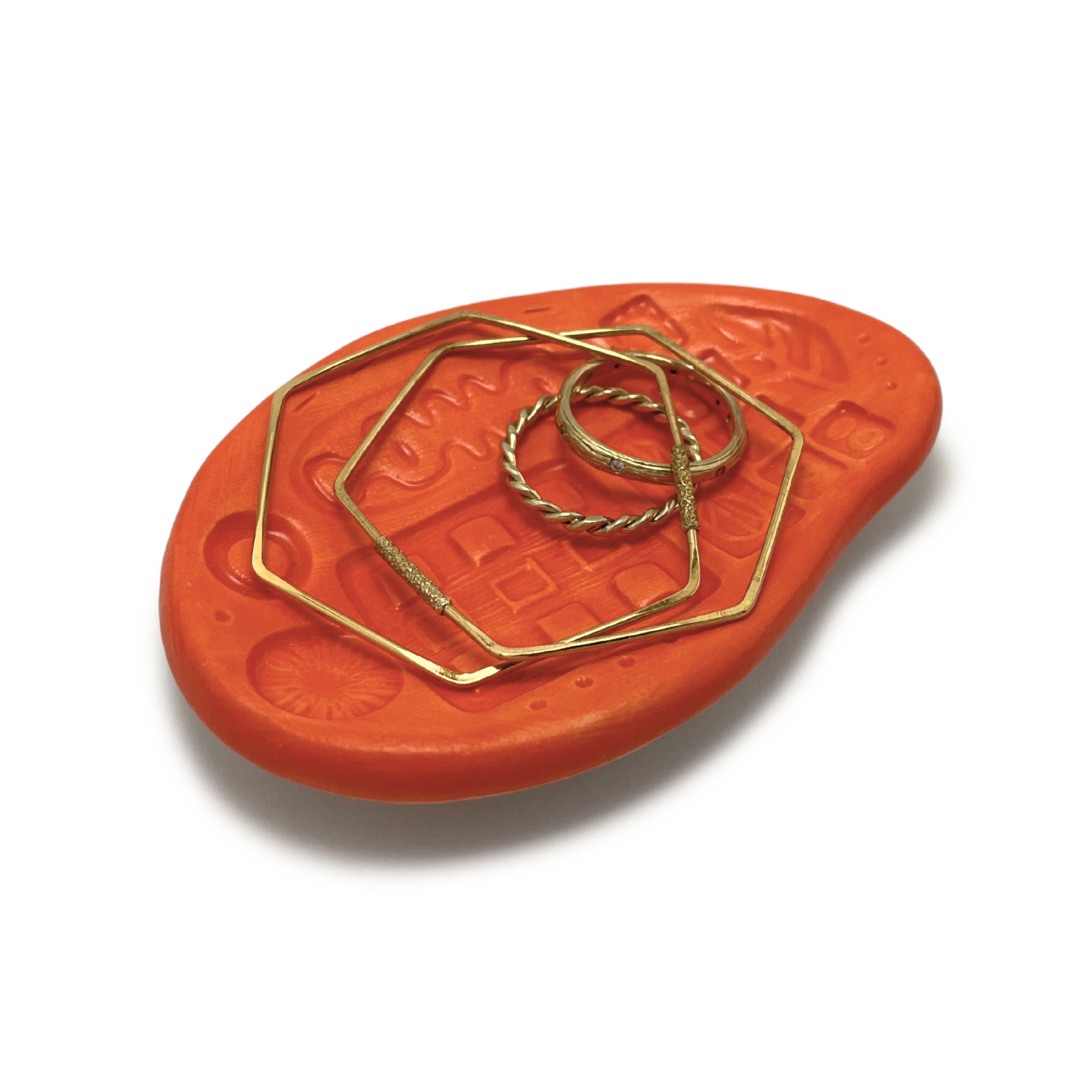 small handmade trinket dish or jewelry ring holder bright orange pattern texture one of a kind