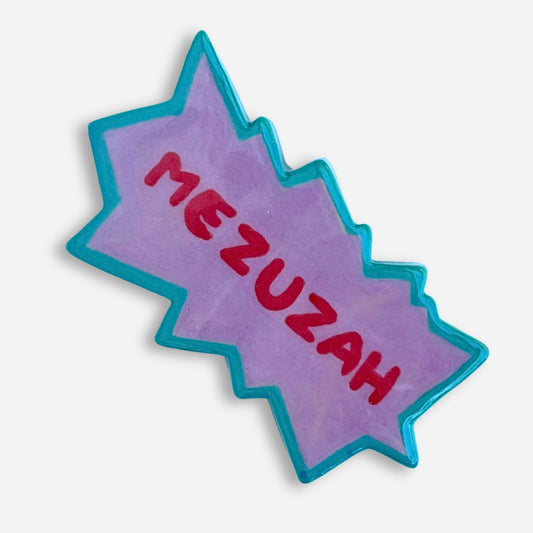 Small handmade mezuzah case shaped like a 90s cartoon title card explosion in teal and purple. Rugrats Nickelodeon style 